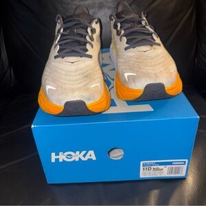 Hoka Sneakers with Orange and Black Details